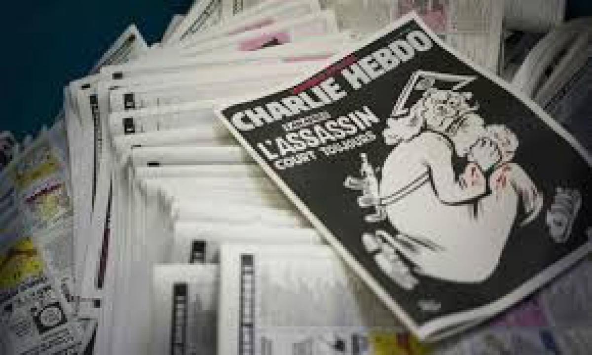 Charlie Hebdo front cover portrays God as a gun-wielding terrorist: Vatican newspaper